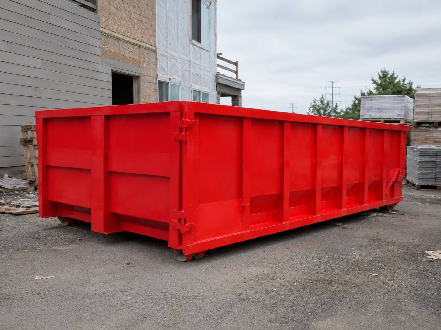 Red roll-off dumpster rental delivered in Phoenixville, PA